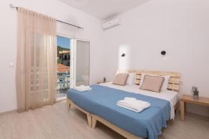 Posteľ alebo postele v izbe v ubytovaní Marion Apartments