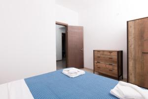 Posteľ alebo postele v izbe v ubytovaní Marion Apartments