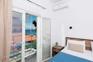 Posteľ alebo postele v izbe v ubytovaní Marion Apartments