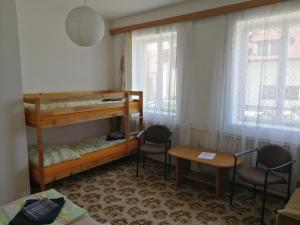 Postel nebo postele na pokoji v ubytování U Ladi