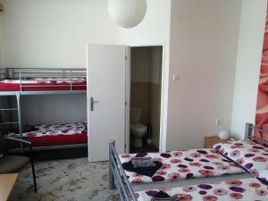 Postel nebo postele na pokoji v ubytování U Ladi
