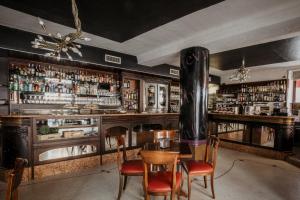 Lounge alebo bar v ubytovaní Vincafè