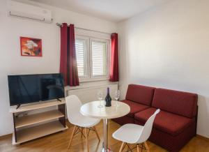 Μια τηλεόραση ή/και κέντρο ψυχαγωγίας στο Apartments Blatančić