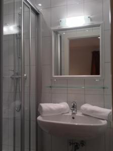 A bathroom at Appartements Basti Még 37 kép