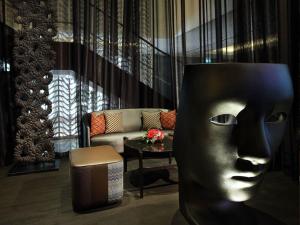 Area soggiorno di Rendezvous Hotel Singapore by Far East Hospitality