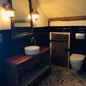 Ένα μπάνιο στο Chambre familiale Élevage Girbal