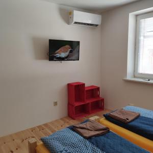 Posteľ alebo postele v izbe v ubytovaní Apartmán Špacír