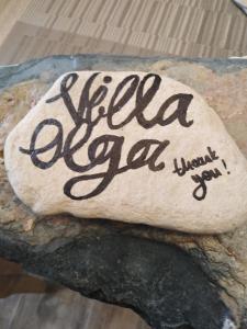 a rock with the words hello open written on it at Villa Olga in Agalianós