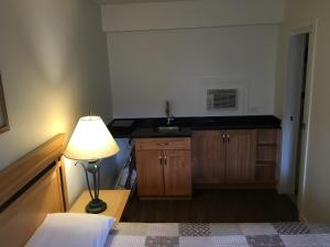 Sunset Motel tesisinde mutfak veya mini mutfak