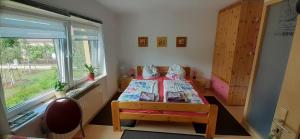 Ein Bett oder Betten in einem Zimmer der Unterkunft Pension "Am Schloß"