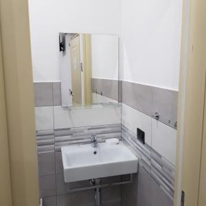 Koupelna v ubytování LE CAMERE DI OLTI