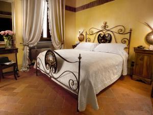Postel nebo postele na pokoji v ubytování Graziella Patio Hotel
