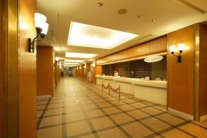 a hallway of a hospital with a waiting room at NASPA New Otani in Yuzawa