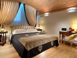 Postel nebo postele na pokoji v ubytování Graziella Patio Hotel