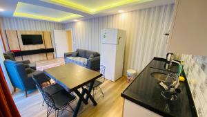 Телевизор и/или развлекательный центр в Kaya Residence