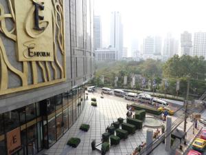 a view of a city street with a building at Lodge 61 Hotel in Bangkok