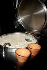 a sink with two bowls and a pot at Agriturismo Tenuta Margitello in Comiso