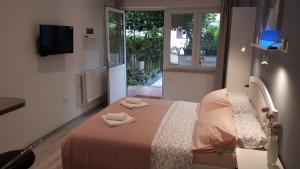 Postel nebo postele na pokoji v ubytování Guesthouse Mila