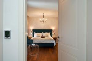 Letto o letti in una camera di Rooms Valery