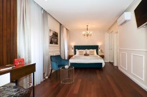 Letto o letti in una camera di Rooms Valery