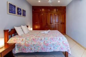 Voodi või voodid majutusasutuse 2-Bedroom Ocean-View Condo with Pool toas