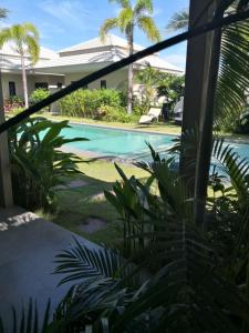 The swimming pool at or close to Tropical House​