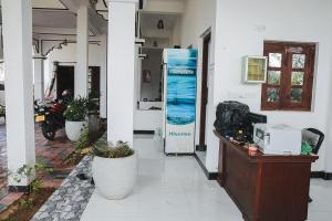 a entrance to a building with a door open at Sunset View Beach Hotel in Arugam Bay