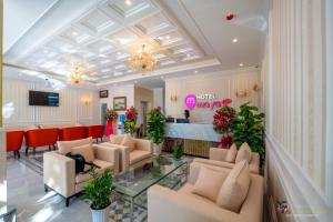 TV a/nebo společenská místnost v ubytování Maya Hotel 2