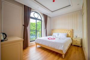 Postel nebo postele na pokoji v ubytování Maya Hotel 2