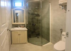 Koupelna v ubytování Maya Hotel 2