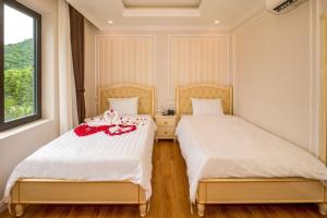 Postel nebo postele na pokoji v ubytování Maya Hotel 2