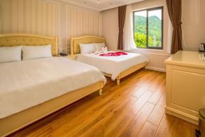 Postel nebo postele na pokoji v ubytování Maya Hotel 2 + 34 fotografií