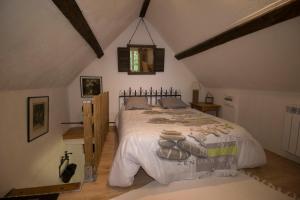 Postel nebo postele na pokoji v ubytování Gîte "L'Annexe du Parc" Sa Vue Splendide