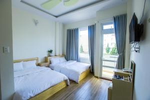 Postel nebo postele na pokoji v ubytování Sơn Liễu Homestay