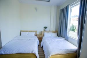 Postel nebo postele na pokoji v ubytování Sơn Liễu Homestay