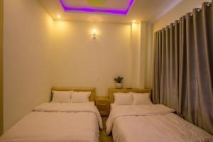 Postel nebo postele na pokoji v ubytování Sơn Liễu Homestay