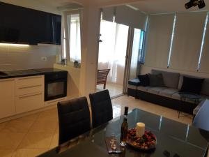 Kuchyň nebo kuchyňský kout v ubytování Apartment Leone Umag