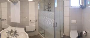 Koupelna v ubytování Apartment Leone Umag