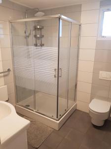 Koupelna v ubytování Apartment Leone Umag