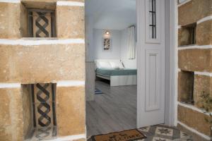 Posteľ alebo postele v izbe v ubytovaní Studio Cozy - In the Heart of Skyros Village