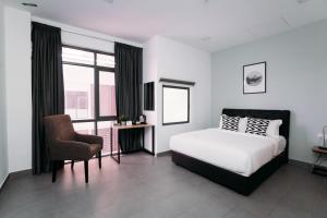 Postel nebo postele na pokoji v ubytování B Lot Hotel + 37 fotografií