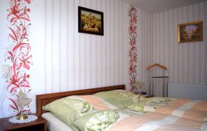 Ένα ή περισσότερα κρεβάτια σε δωμάτιο στο Haus Tadeus