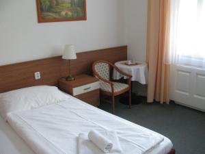 Posteľ alebo postele v izbe v ubytovaní Villa Dagmar