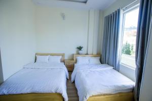 Postel nebo postele na pokoji v ubytování Sơn Liễu Homestay