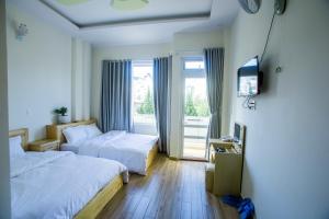 TV a/nebo společenská místnost v ubytování Sơn Liễu Homestay