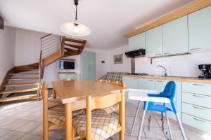 Η κουζίνα ή μικρή κουζίνα στο Appartamenti Lignano Sabbiadoro - Villa Ammiraglia +80 φωτογραφίες