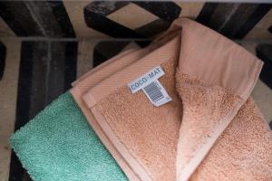 a pile of towels with a price tag on them at Studio Cozy - In the Heart of Skyros Village in Skiros