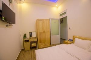 Postel nebo postele na pokoji v ubytování Sơn Liễu Homestay
