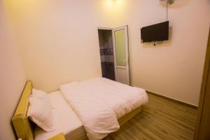 Postel nebo postele na pokoji v ubytování Sơn Liễu Homestay