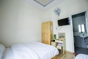 TV a/nebo společenská místnost v ubytování Sơn Liễu Homestay